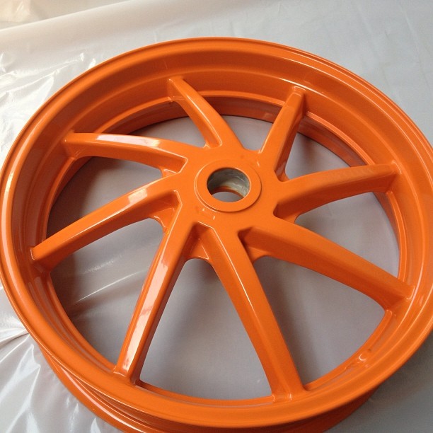 Motor bike wheel powdercoated#Repsol Honda colours